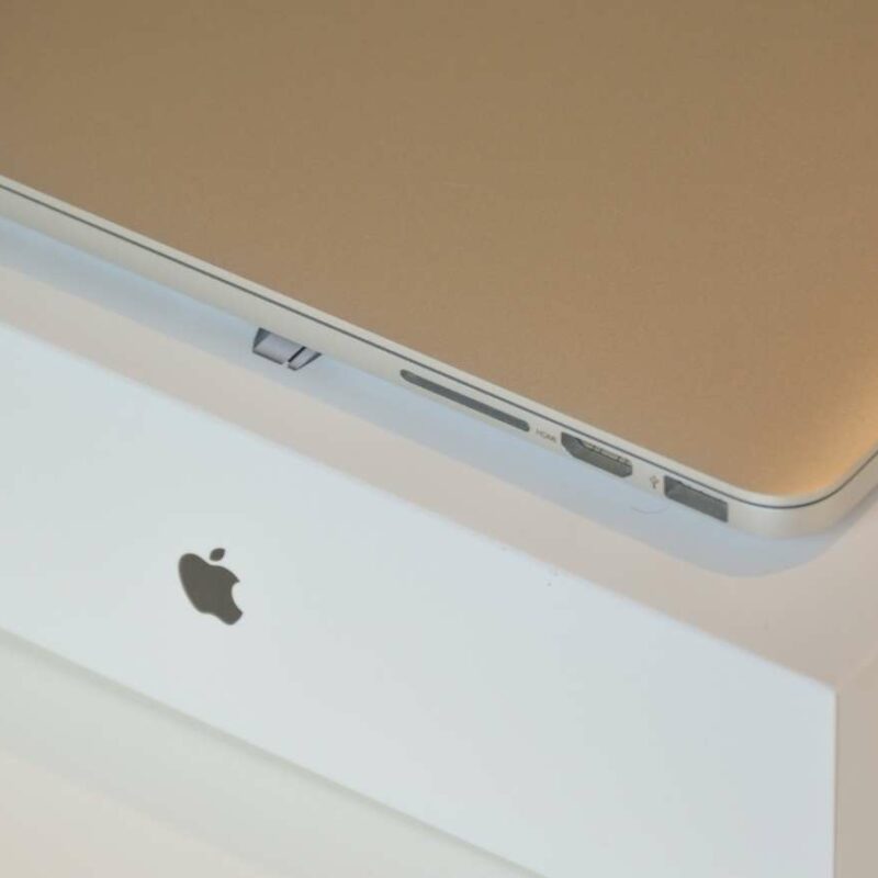 Macbook on a desk.